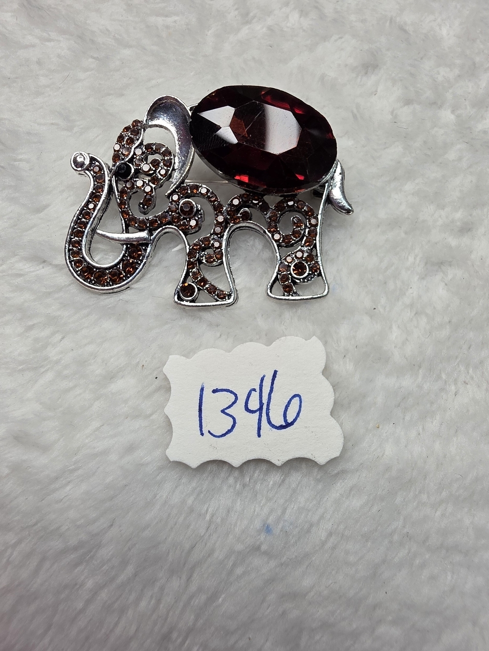 Silver Elephant Brooch with Deep Brown Gem Accent
